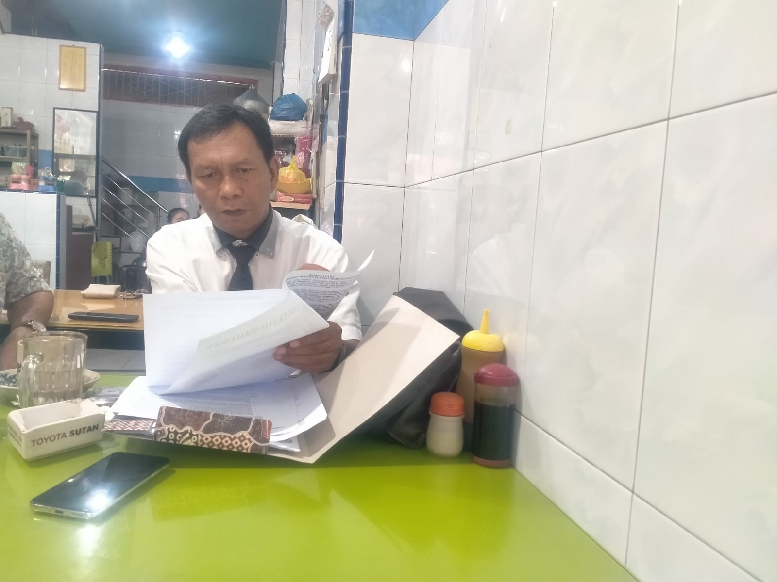 Binaris Situmorang SH