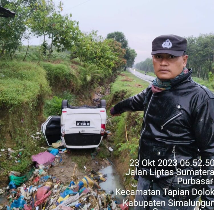Mobil Toyota Avanza BK 1858 LAG Yang Terbalik saat di Lokasi Kejadian