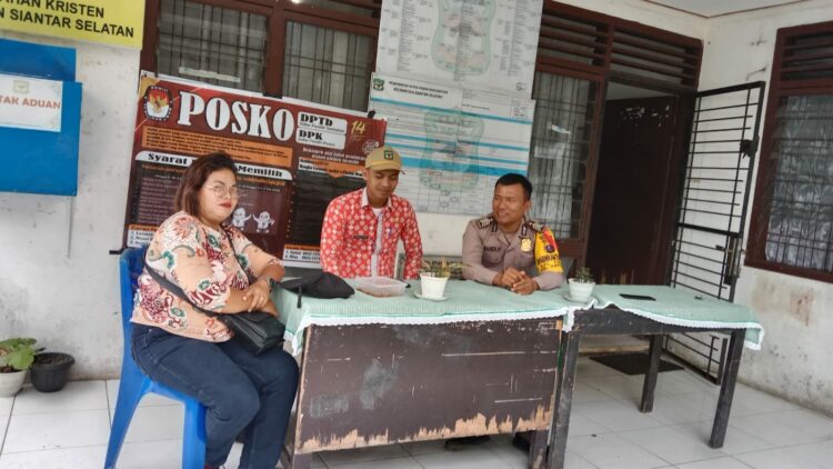 Jelang Pemilu, Bhabinkamtibmas Polsek Siantar Selatan Sambangi Kantor Lurah Kristen