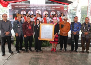 Joni Henrudin Saragih Pemenang Lomba Cipta Mars Kota Pematang Siantar 