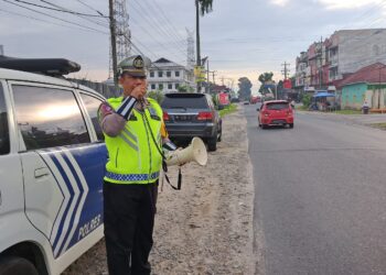 Sat Lantas Polres Simalungun Penyuluhan Keliling Tertib Berlalulintas di Jalan Asahan 