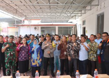 Kapolres Siantar Hadiri Penyerahan Beras Bantuan Pangan Nasional Kepada Warga