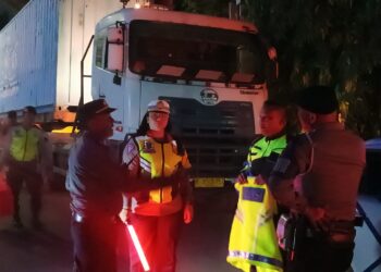 Polres Pematangsiantar Gelar Pengamanan Jalur Dan Pengawalan Truck Logistik F1H2O Menuju Toba