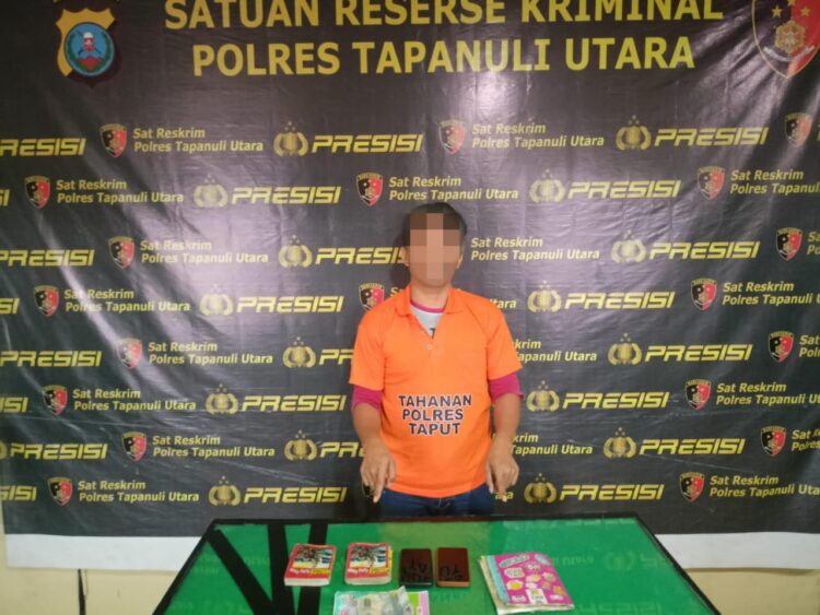 Polres Taput Amankan Pelaku Judi Togel Dari Adiankoting