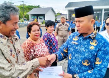 Upacara HKN Di Simalungun Dirangkai Dengan Bulan Sadar Pajak dan Pemberian Tali Asih Kepada ASN Pensiun