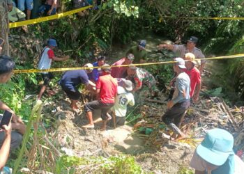 Polsek Bangun Evakuasi Mayat Wanita di Tali Air Irigasi Simalungun