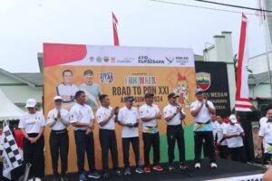 Personil Sat Brimob Polda Sumut Ikut Meriahkan Jalan Sehat Road To PON XXI Aceh-Sumut 2024