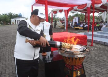 Kapolres Pimpin Upacara Kirab Api PON XXI Aceh-Sumut 2024, Disambut Meriah Masyarakat Kabupaten Simalungun
