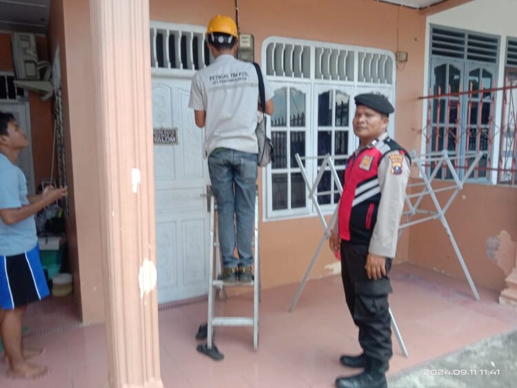 Personil Sat Samapta Kawal Petugas PLN UP3 Kota Pematangsiantar Dalam Operasi P2TL