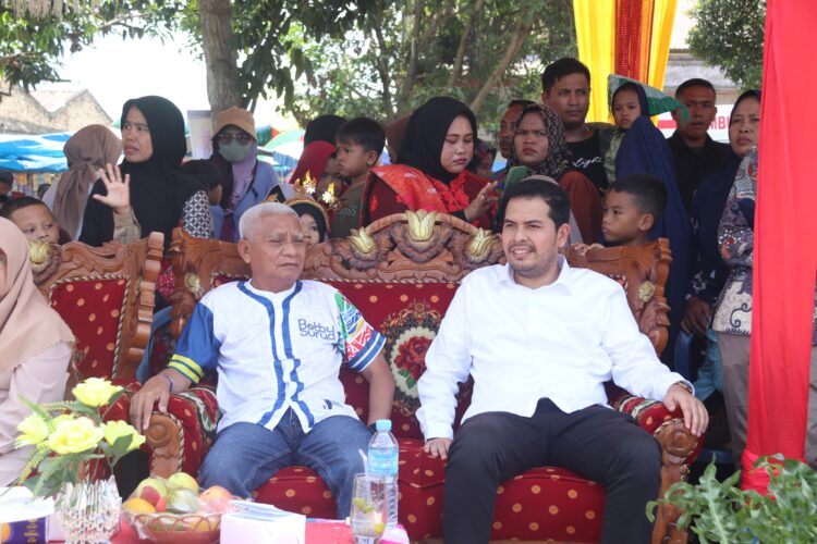 Dua Calon Wakil, Surya dan Azi Hadiri HUT Desa Bandar Tinggi Ke-135