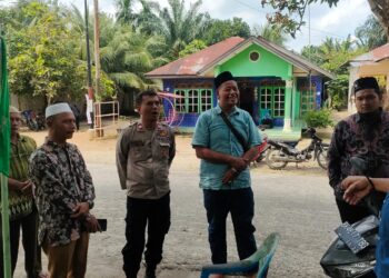 Bhabinkamtibmas Polsek Perdagangan Sambangi Warga Berduka, Sampaikan Pesan Kamtibmas di Nagori Panombean Baru