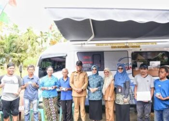 Pj Bupati Tapteng Launching Mobil Pelayanan Keliling Dinas Kependudukan Dan Catatan Sipil Tapteng