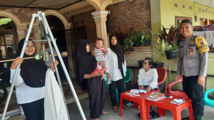 Sambang Ke Posyandu Bahagia, Bhabinkamtibmas Polsek Siantar Utara Sampaikan Pesan Kamtibmas