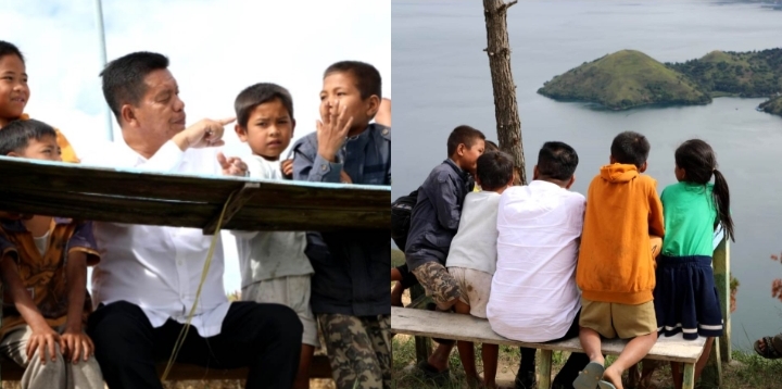 Bupati Radiapoh Hasiholan Sinaga bersenda gurau dan menatap birunya air Danau Toba bersama anak anak warga setempat (Zai)