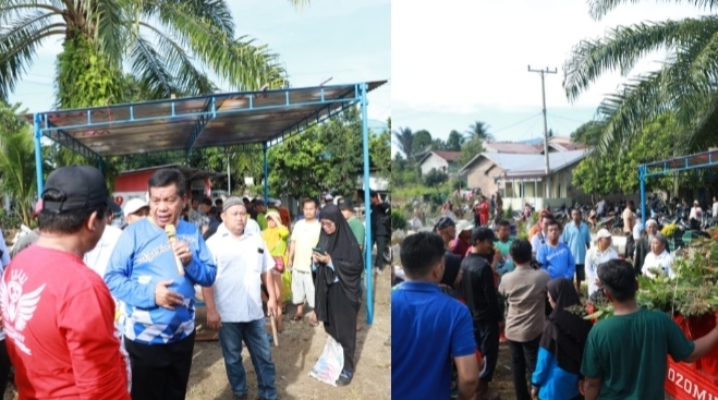 Calon Bupati Simalungun Radiapoh Hasiholan Sinaga saat menyambangi masyarakat yang sedang Marharoan Bolon