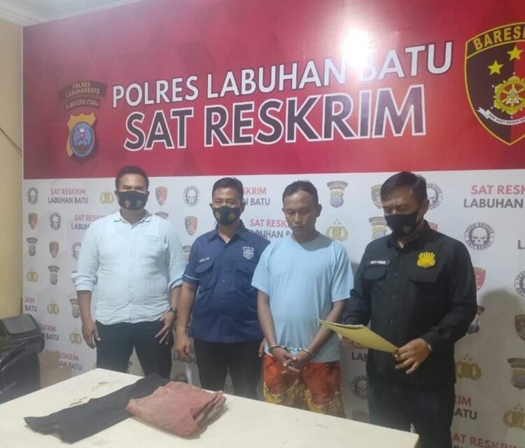 Tersangka AHH diamankan di Polres Labuhan Batu.