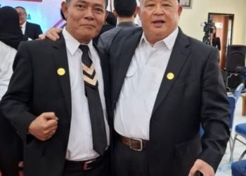 Pardomuan Nauli Simanjuntak, SH bersama ketua umum DPP PERADI Pergerakan.