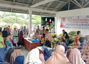 Polsek Bosar Maligas bersama personel  Simalungun menggelar kegiatan Gerakan Pasar Murah di Pekan Mingguan Kelurahan Bosar Maligas, Kecamatan Bosar Maligas, Kabupaten Simalungun, Selasa (19/8/2025).( Nawasenanews/ Ist)