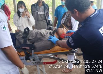 Korban bunuh diri bernama Fernando Sahlan Turnip ditemukan dalam kondisi gantung diri di gubuk perladangan milik Mak Fani Purba di Purba Tongah saat dievakuasi dan diotopsi oleh Inafis
( Nawasenanews/ Ist)