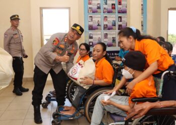 Hut ke -78 Bhayangkara, Polresta Denpasar Lakukan Bhakti Kesehatan dan Bagi Sembako di Yayasan Bunga Bali