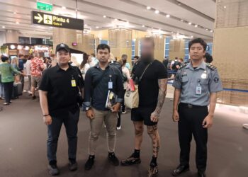 Imigrasi Ngurah Rai Lakukan Pendeportasian Subjek Red Notice Interpol Asal Kanada Kasus Penipuan