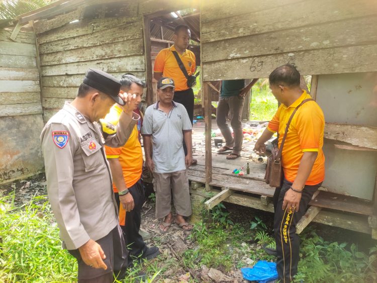 MD saat diamankan Polres Labuhanbatu dari belakang rumah warga.