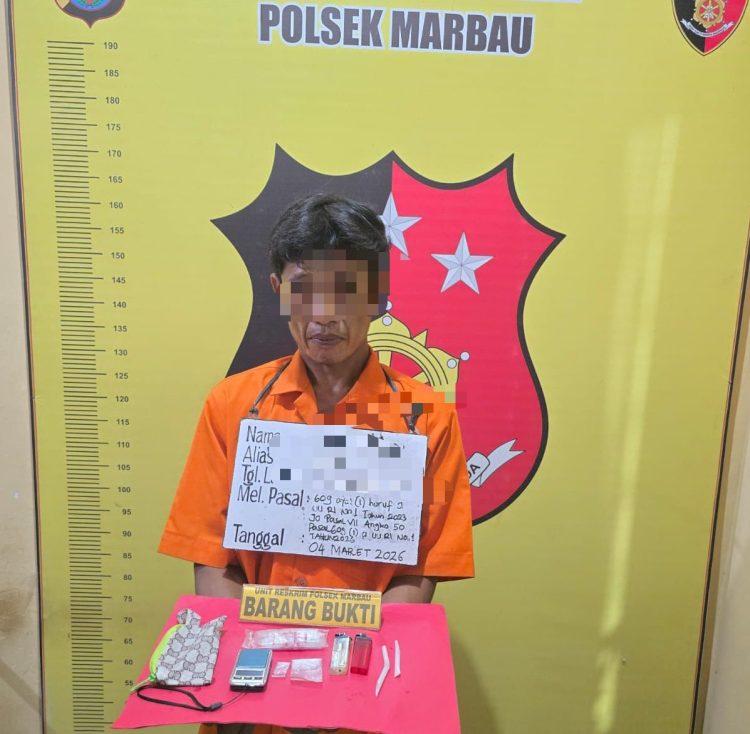 JH (43), warga Kabupaten Simalungun saat diamankan tersandung kasus narkoba.