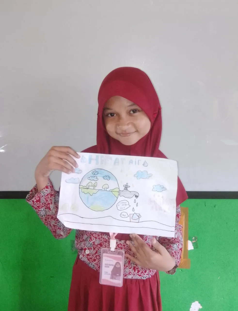 Membuat poster menghemat air