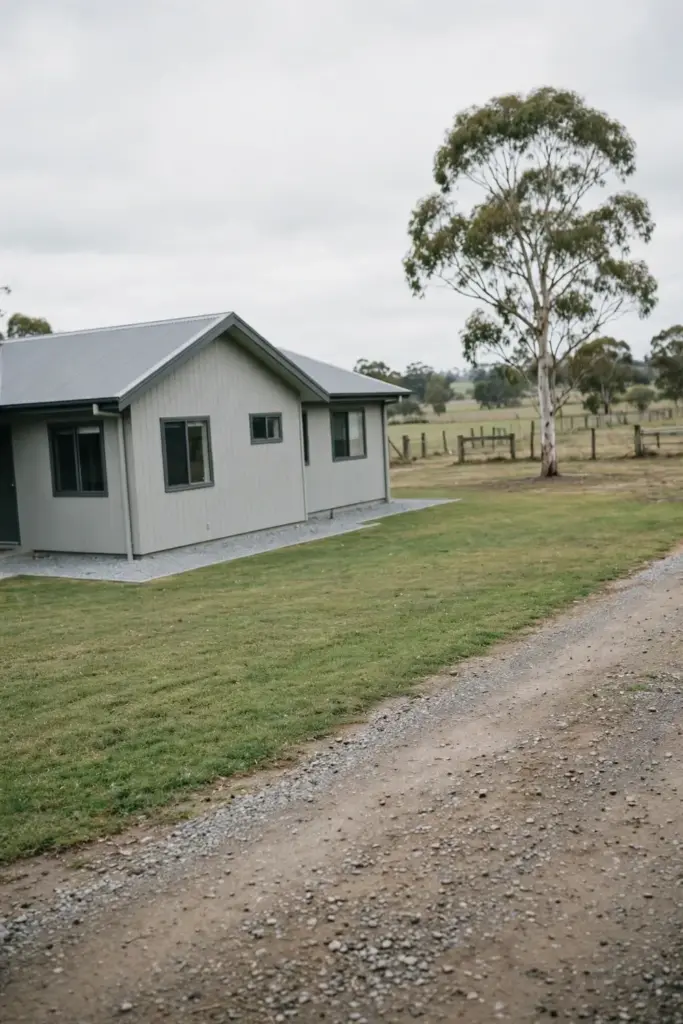 House with a clear low-fuel zone and a gum tree standing well outside the zone