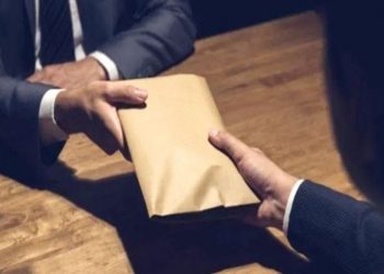 Ilustrasi suap untuk dapatkan proyek, Senin (11/4).