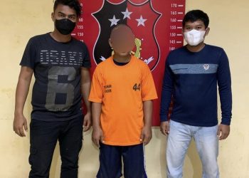 Tersanga ED saat diamankan di Polresta Deliserdang, Jumat (24/6).