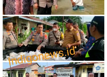 Kapolresta Deliserdang, Kombes. Pol. Irsan Sinuhaji bersama jajaran saat tinjau kembali banjir dan pemberian bantuan sembako, Senin (21/11).