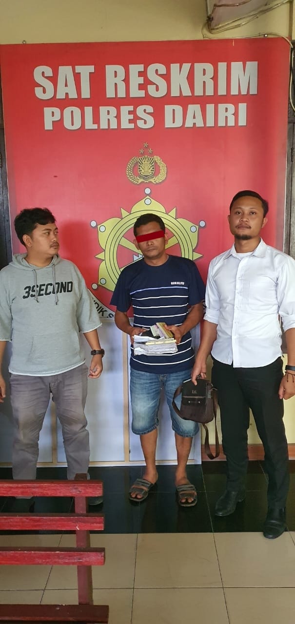 Tersangka, ATG saat diamankan di Polres Dairi, Senin (5/12).