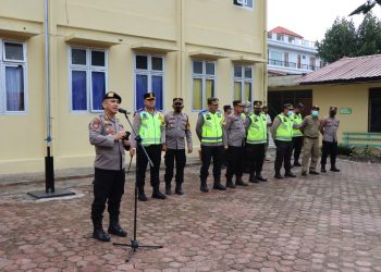 Polres Tapanuli Utara bersama Kodim 0210/TU dan Satpol PP saat gelar apel kesiapan pengamanan malam Natal, Sabtu (24/12)