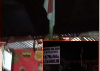 Bendera yang berkibar 7 x 24 jam dikantor Kades Longkotan - Dairi, Rabu (7/12).
