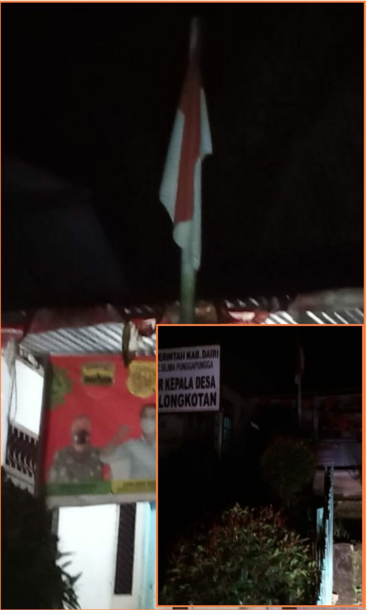 Bendera yang berkibar 7 x 24 jam dikantor Kades Longkotan - Dairi, Rabu (7/12).