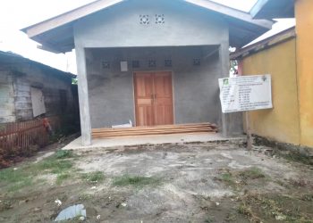 Rumah isolasi yang beralih fungsi menjadi gudang pupuk, Senin (27/2).