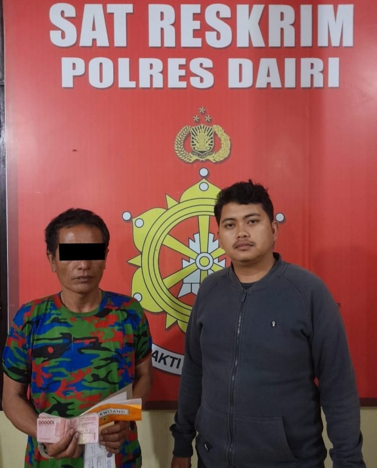 Anggota SPSI Dairi, NS saat diamankan di Polres Dairi, Rabu (8/3).