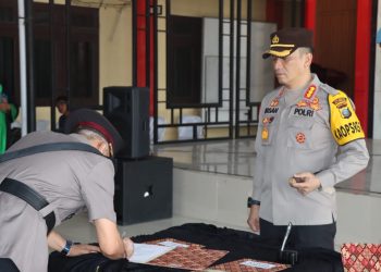 Kapolresta Deliserdang, Kombes. Pol. Irsan saat pimpin sertijab, Sabtu (25/3).
