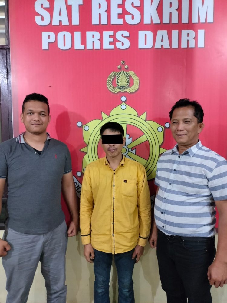 Tersangka, SS saat diamankan di Mapolres Dairi, Selasa (28/3).