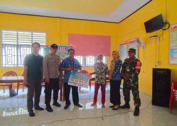 AIPDA Fikri saat hadir penyaluran BLT DD TA 2023 di Desa Bangun Rejo, Kamis (30/3).