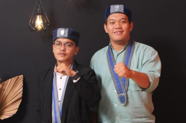 Ketua GMKI PSS, Theo Naibaho didampingi Cavin Tampubolon, Senin (22/5).