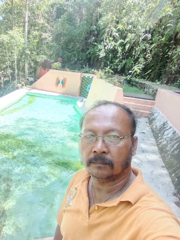 Ketua DPW LP4 Sumut, Pahala Sihombing SE saat tinjau lapangan bersama penyidik Kejari Simalungun, Jumat (2/6).