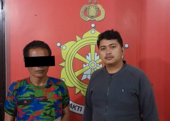Tersangka NS saat diamankan di Polres Dairi, Selasa (6/6).