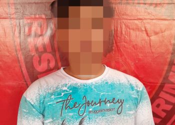 Tersangka IMP saat diamankan di Polres Taput, Senin (12/6).