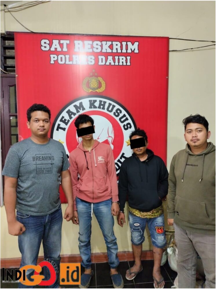 Tersangka, Anton Ginting bersama Erik Pinem saat diamankan di Polres Dairi, Sabtu (1/7).