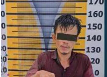 Tersangka ZAS saat diamankan di Mapolres Tebing Tinggi, Selasa (11/7).