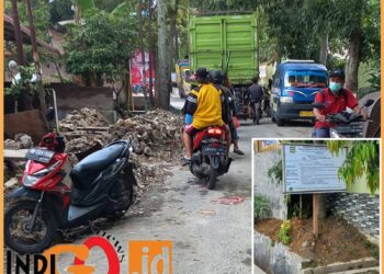 Kondisi jalan Pdt. J Wismar lokasi proyek yang macer karena sedimen dan material ditimbun di bahu jalan, Sabtu (12/8).