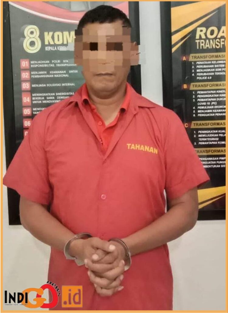 Indra Alamsyah, mantan Anggota DPRD Sumut saat diamankan di Polda Sumut, Senin (21/8).