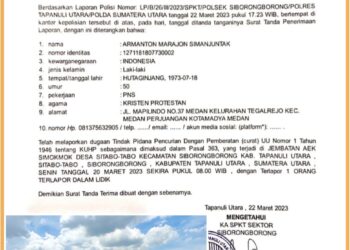 Surat laporan pencurian aset Negara dan jajaran Polsek Siborongborong saat cek TKP, Jumat (8/9).